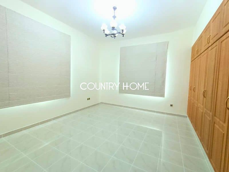 Spacious 5-BR Villa with Study, Private Garden & Close to SZR in Al Manara