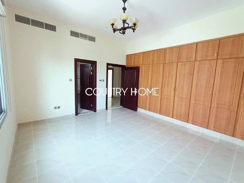 Spacious 5-BR Villa with Study, Private Garden & Close to SZR in Al Manara - Image 8