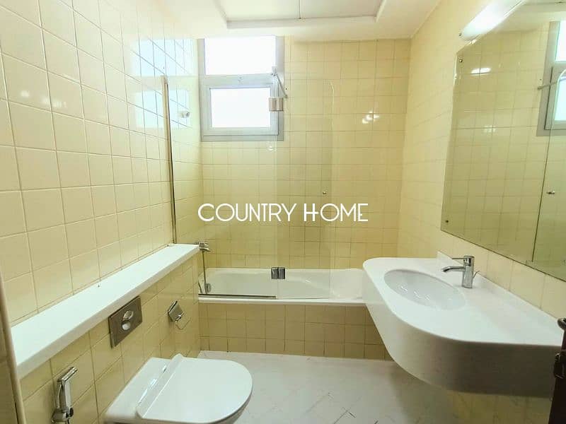 Spacious 5-BR Villa with Study, Private Garden & Close to SZR in Al Manara - Image 15