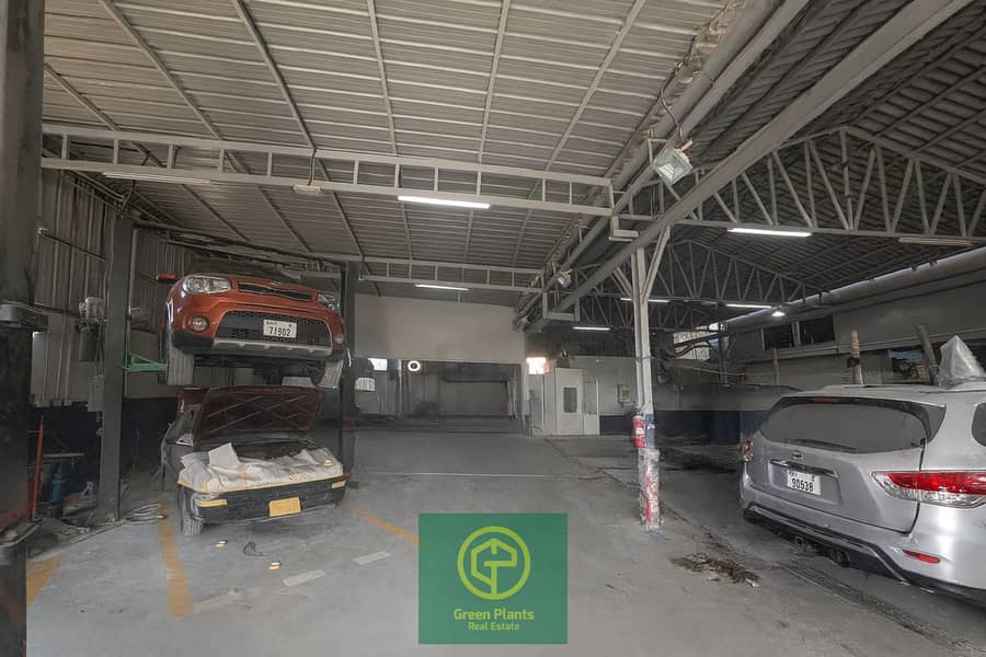 2 Automotive repair garage interior view. png