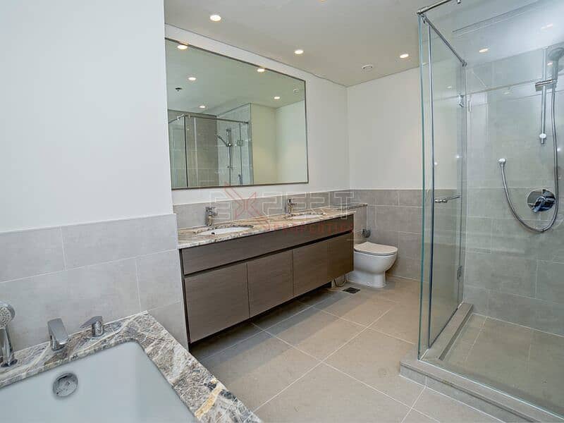 Open Layout | Bright & Spacious Unit | Stunning City Views - Image 10