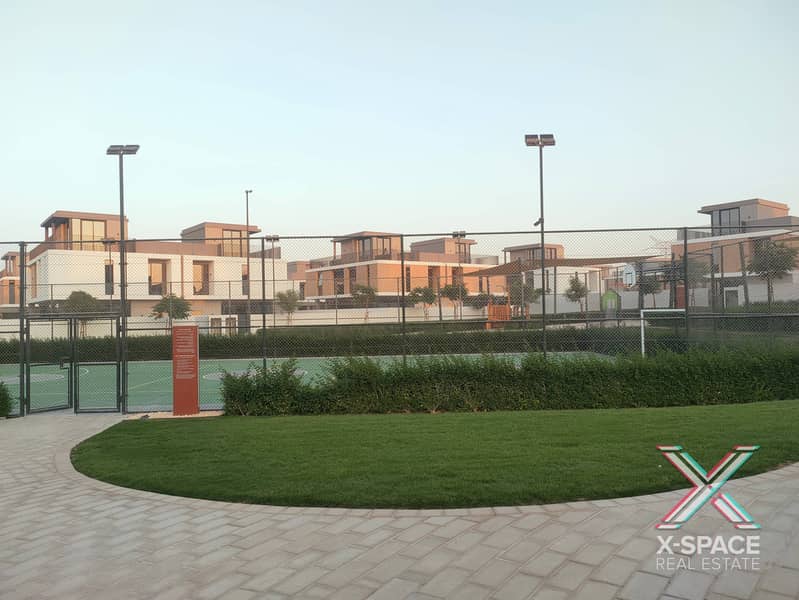 Single Row Brand New with Lush Green Backyard - Image 17