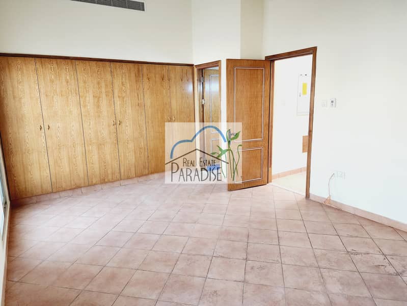 private entrance 3 bedrooms villa /private back yard /corner unit /living area/fitted kitchen /maids room/covered parking/ available for rent mirdif - Image 11