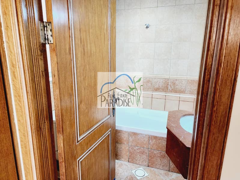 private entrance 3 bedrooms villa /private back yard /corner unit /living area/fitted kitchen /maids room/covered parking/ available for rent mirdif - Image 12