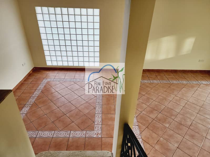 private entrance 3 bedrooms villa /private back yard /corner unit /living area/fitted kitchen /maids room/covered parking/ available for rent mirdif - Image 16