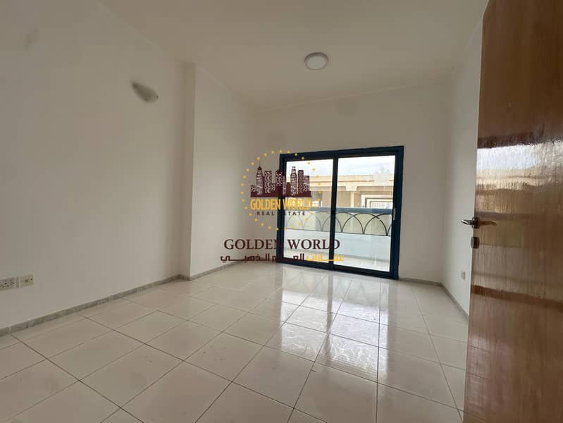 2-bedroom apartment with living room in Al Majaz 1, free AC, 2 bathrooms and balcony. Prime location near services, practical layout and comfort.