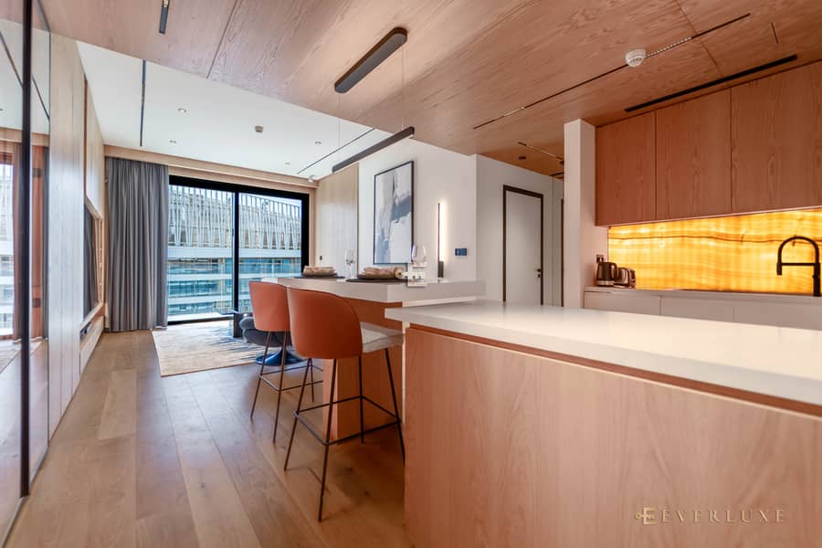 Warm Minimalist Waterfront Residence with Sea & Palm Jumeirah Views - Image 9