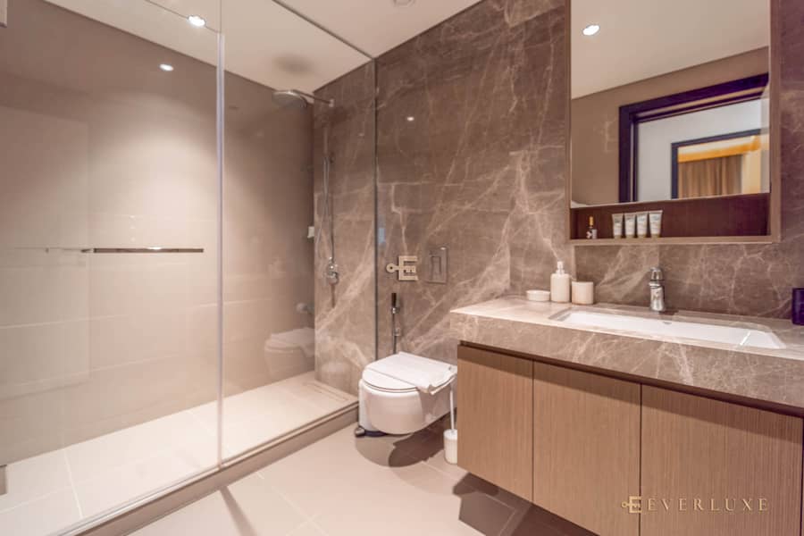 Warm Minimalist Waterfront Residence with Sea & Palm Jumeirah Views - Image 18