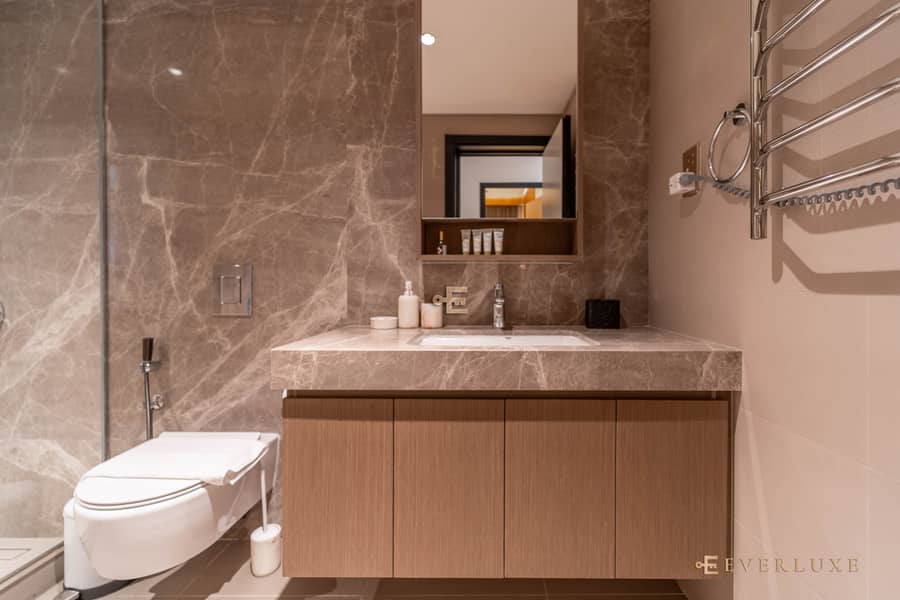 Warm Minimalist Waterfront Residence with Sea & Palm Jumeirah Views - Image 19