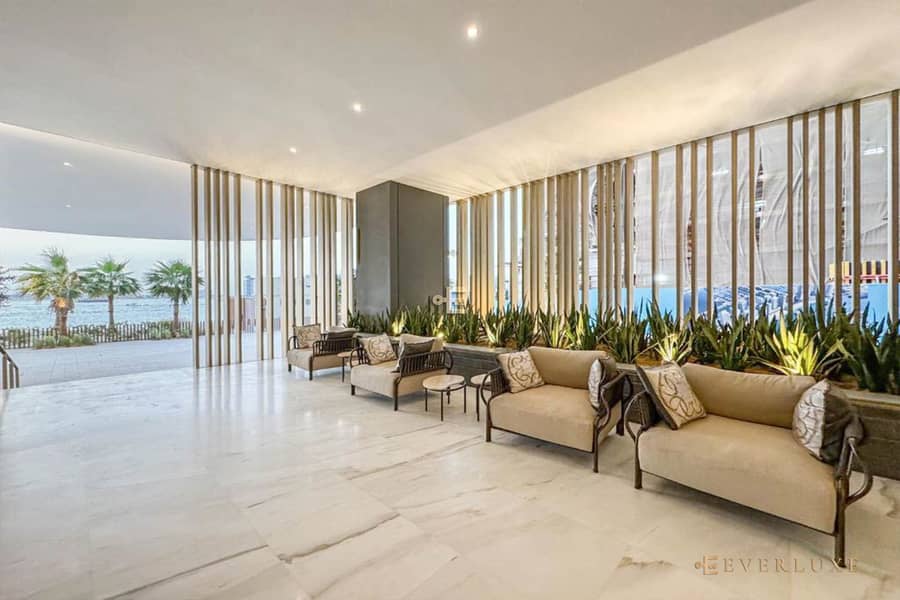 Warm Minimalist Waterfront Residence with Sea & Palm Jumeirah Views - Image 32