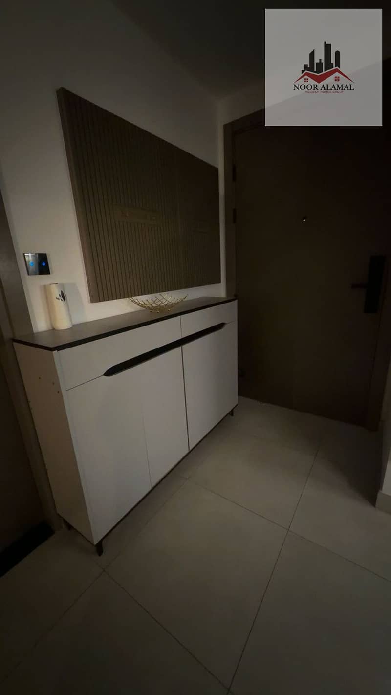 Dubai, fully furnished super deluxe apartment, second occupancy, one bedroom, living room, kitchen, and two bathrooms. Price: 10,000 AED including int - Image 6