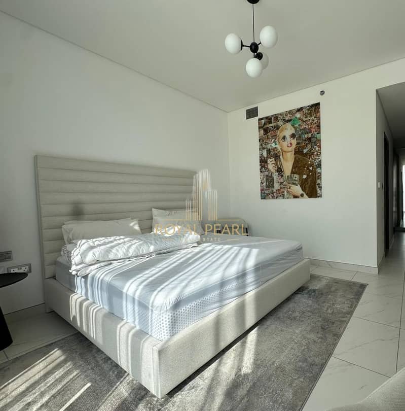 FULLY FURNISHED/ READY TO MOVE IN/LAGOON VIEWS/LOW FLOOR