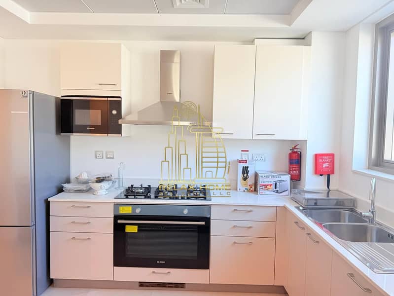 Furnished 2BHK | Gym & Pool | Laundry Room | Brand New - Image 11