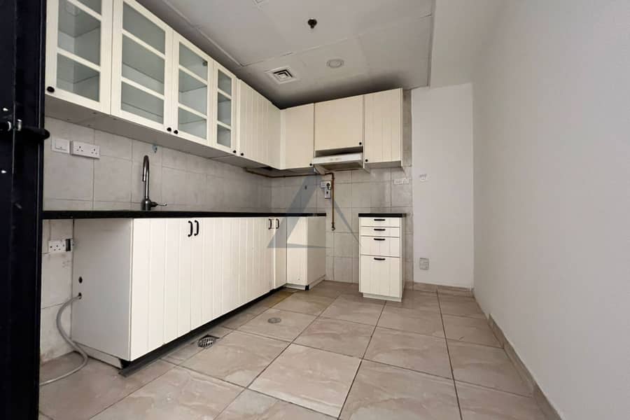 Spacious 2BR with Separate Storage Room fully Close Kitchen . - Image 11