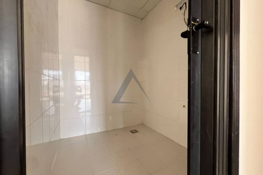 Spacious 2BR with Separate Storage Room fully Close Kitchen . - Image 13