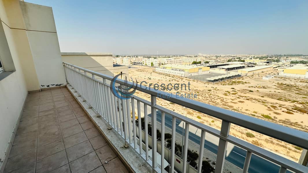 Spacious 1BR Apartment in Mazaya 23 | Liwan - Image 7