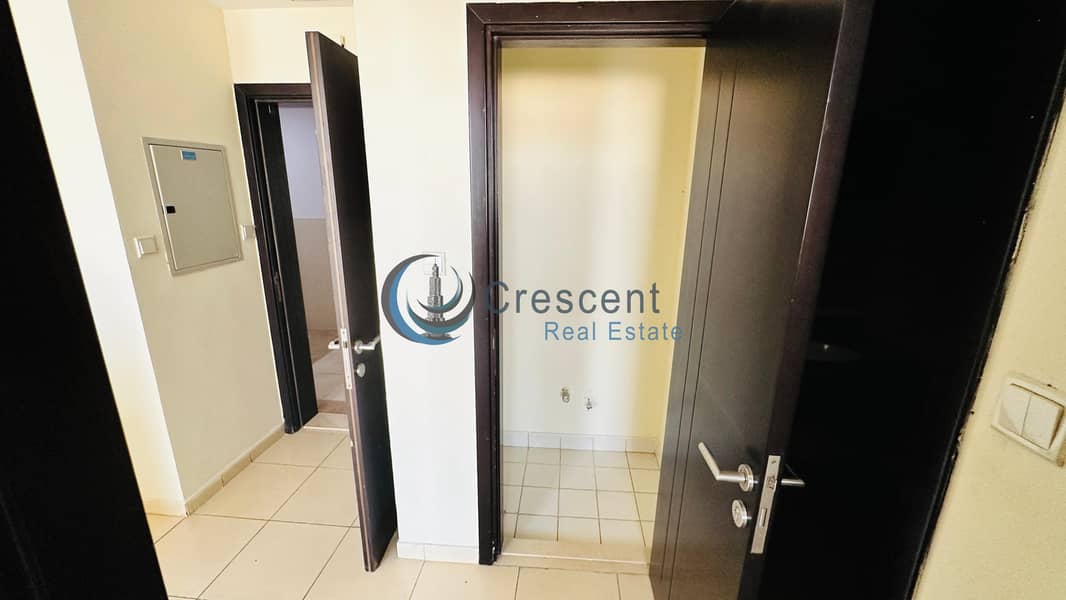 Spacious 1BR Apartment in Mazaya 23 | Liwan - Image 14