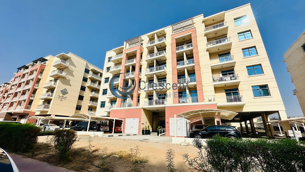 Spacious 1BR Apartment in Mazaya 23 | Liwan - Image 17