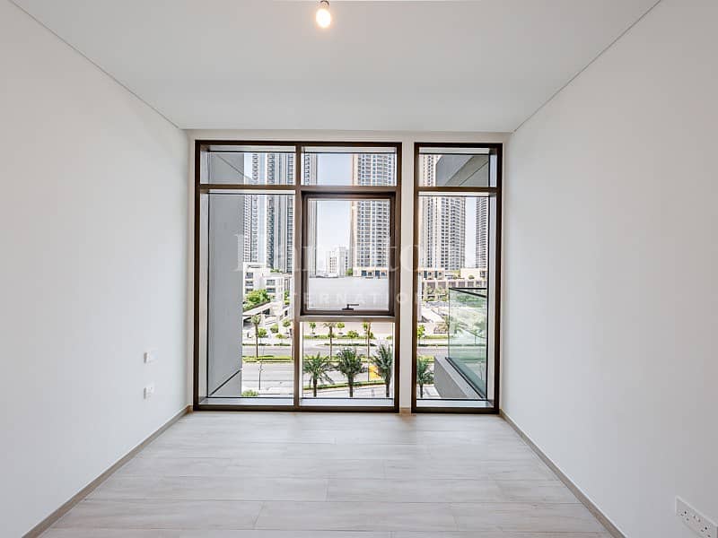 Unfurnished | Mid Floor | Community View