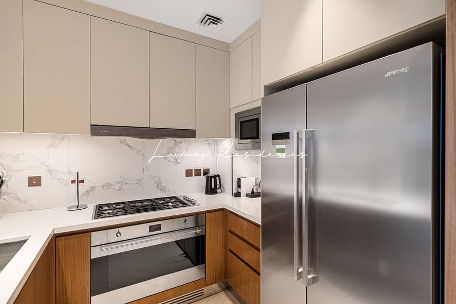 **Iconic Burj View | Opera District Lifestyle** - Image 9