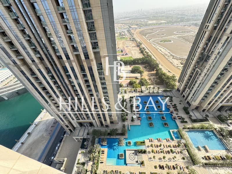 2BR | Unfurnished | Pool & Partial Canal View