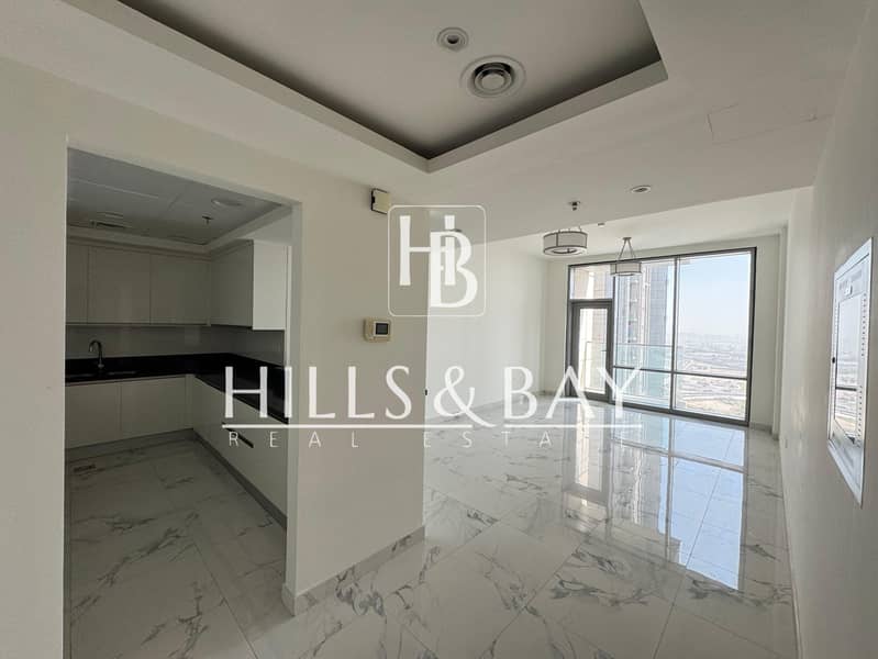 2BR | Unfurnished | Pool & Partial Canal View