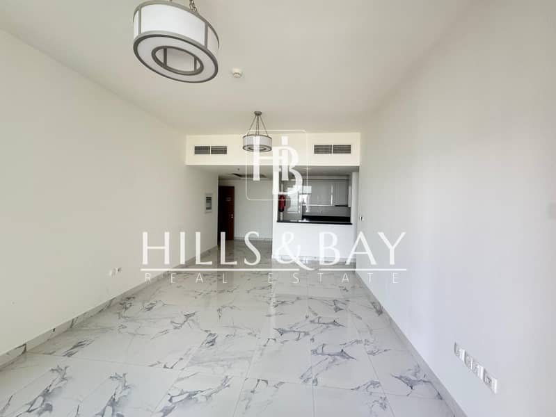 2BR | Unfurnished | Pool & Partial Canal View