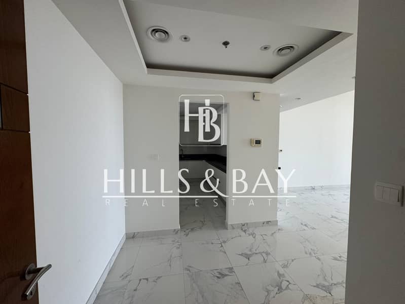 2BR | Unfurnished | Pool & Partial Canal View