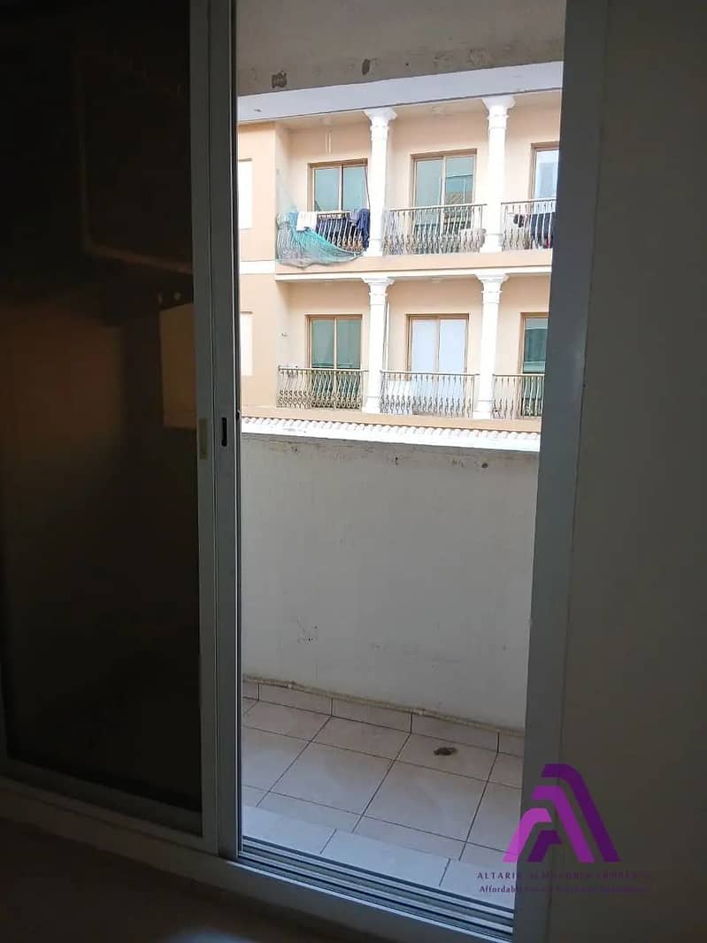 Smart Living Opportunity | 1BR Apartment with Parking | Al Warsan First - Image 9