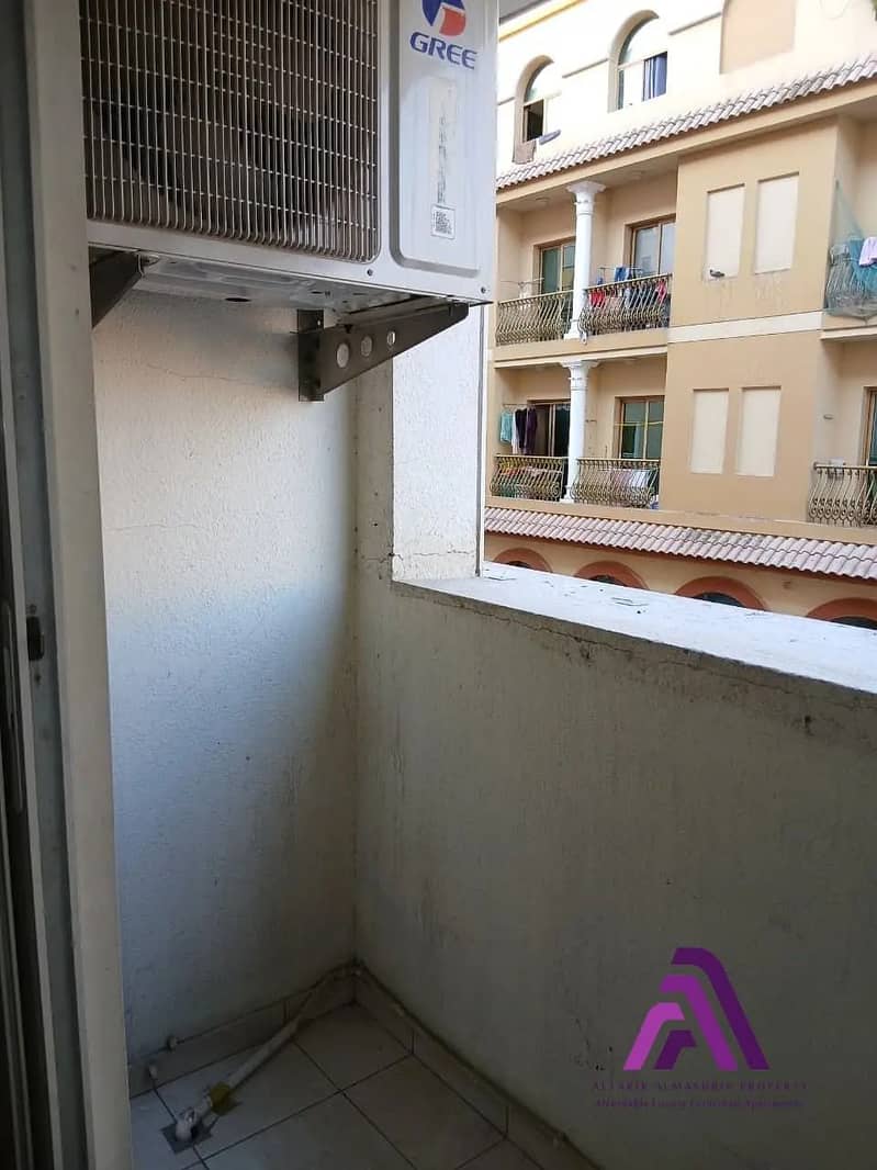 Smart Living Opportunity | 1BR Apartment with Parking | Al Warsan First - Image 10
