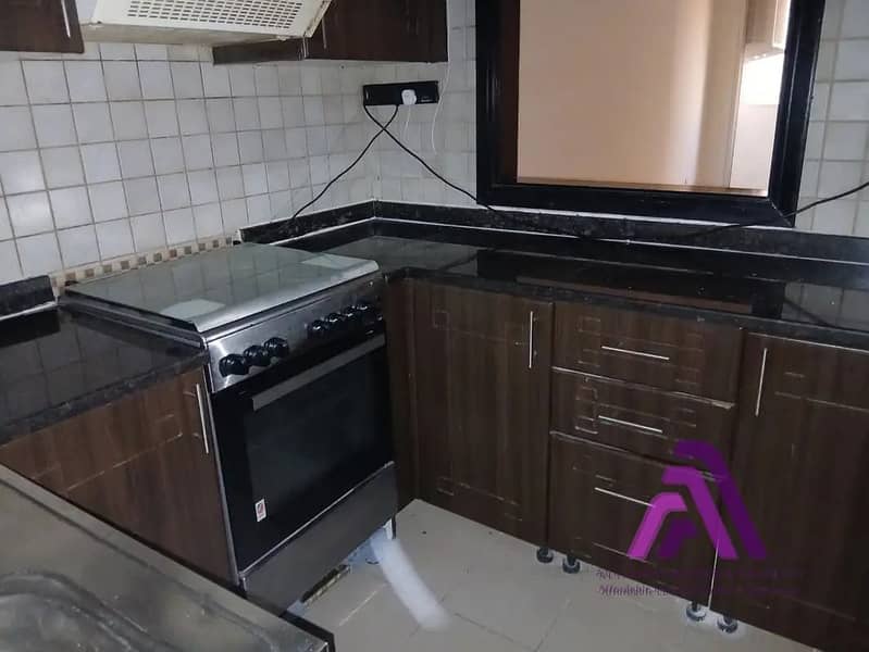 Smart Living Opportunity | 1BR Apartment with Parking | Al Warsan First - Image 12