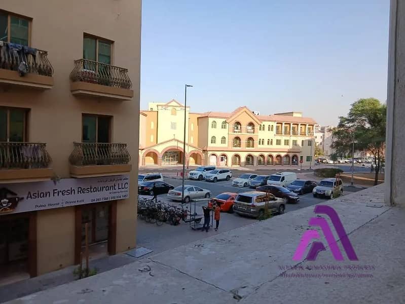 Smart Living Opportunity | 1BR Apartment with Parking | Al Warsan First - Image 13