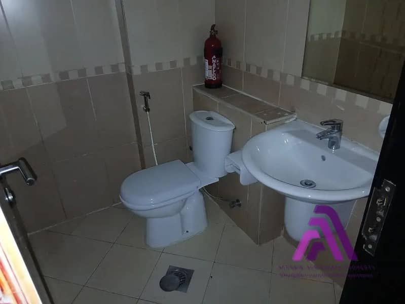 Smart Living Opportunity | 1BR Apartment with Parking | Al Warsan First - Image 15