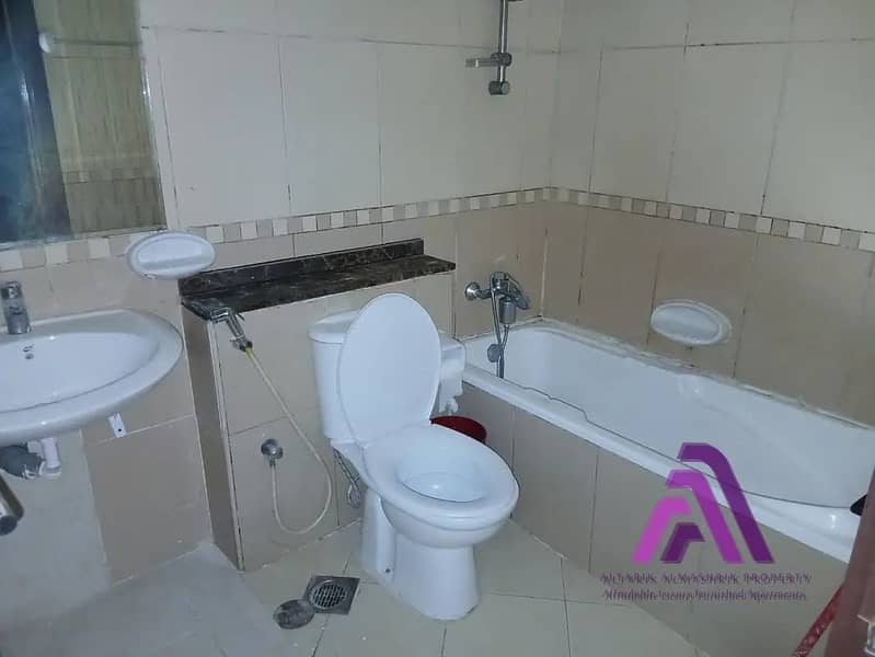 Smart Living Opportunity | 1BR Apartment with Parking | Al Warsan First - Image 16