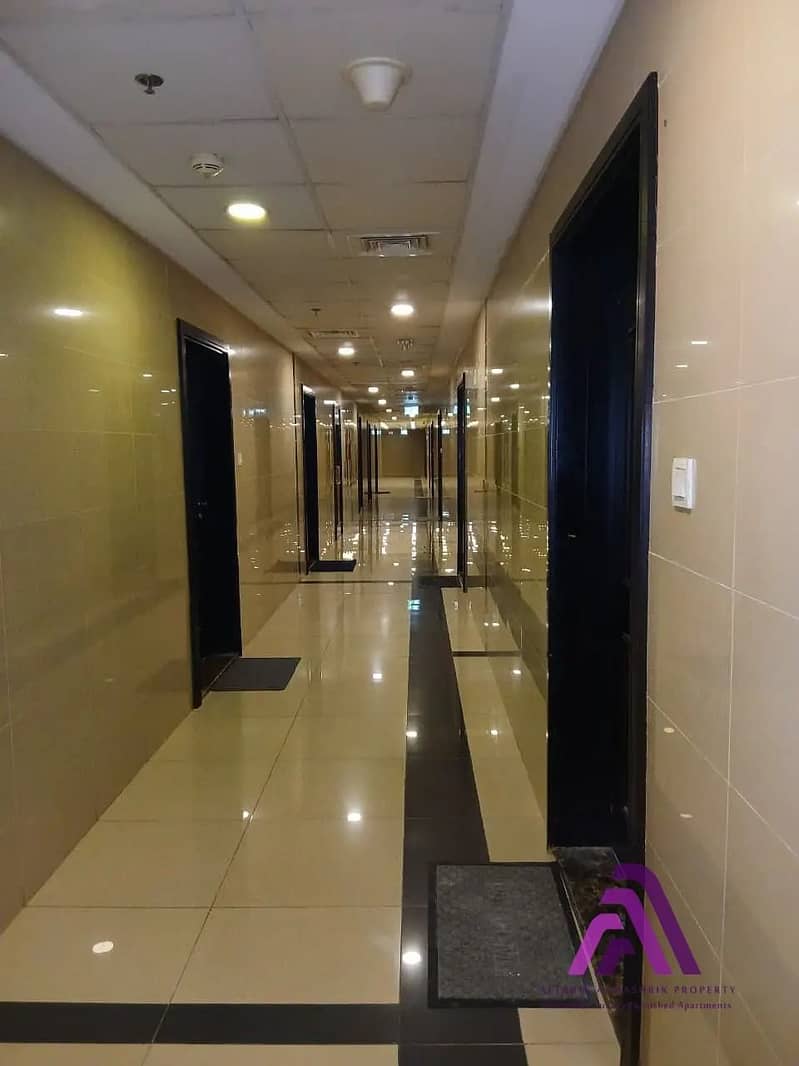 Smart Living Opportunity | 1BR Apartment with Parking | Al Warsan First - Image 18
