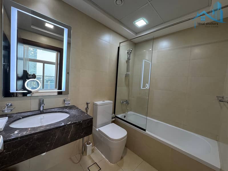 Luxury Living 2BR Dewa Included Fully Furnished - Image 22