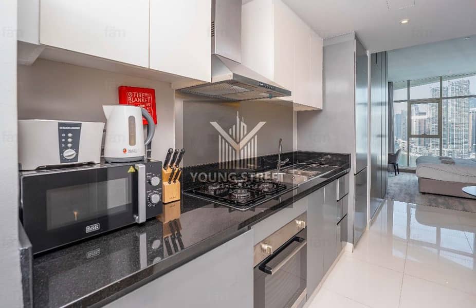 Luxury Studio for Sale in Prive by DAMAC | Stunning Pool & Canal Views - Image 10