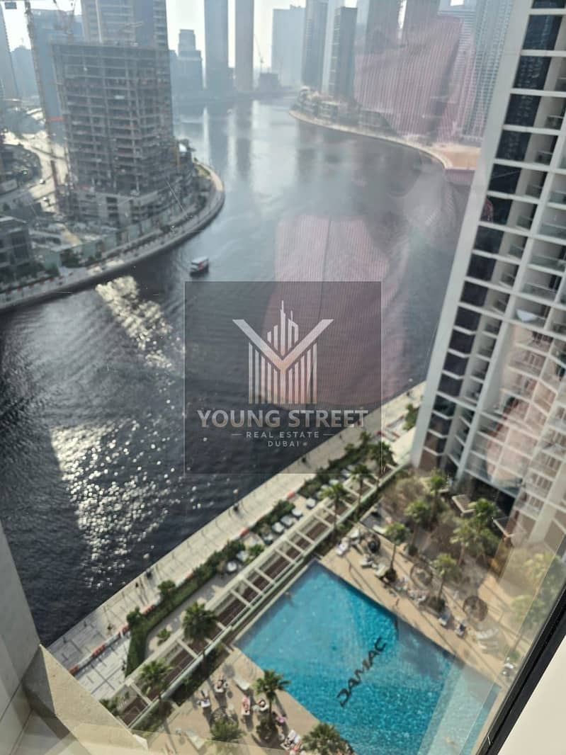 Luxury Studio for Sale in Prive by DAMAC | Stunning Pool & Canal Views - Image 13