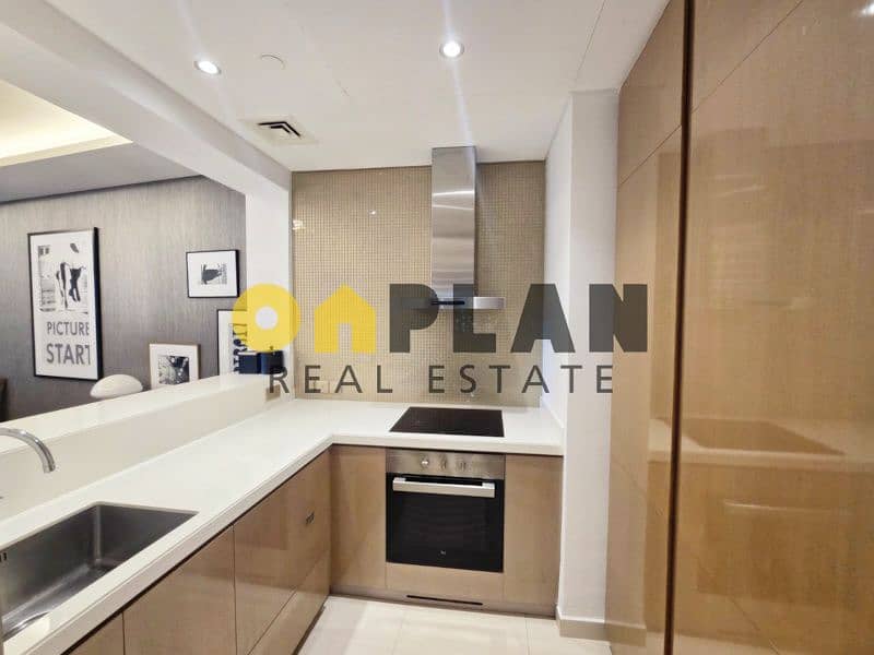 Luxury 1BR Furnished | Easy Access High Floor | Pool View - Image 12