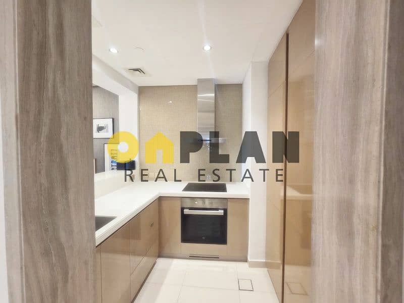 Luxury 1BR Furnished | Easy Access High Floor | Pool View - Image 13