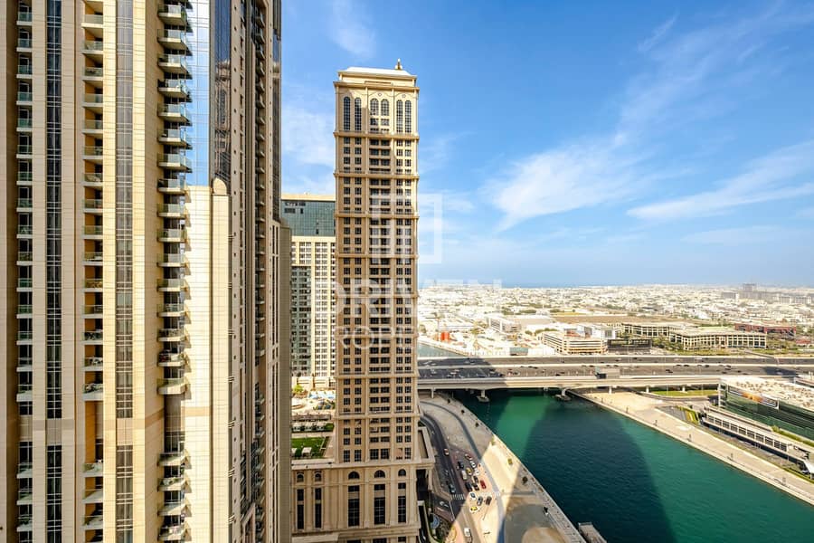 Canal and Amenities Views | Vacant | High Floor