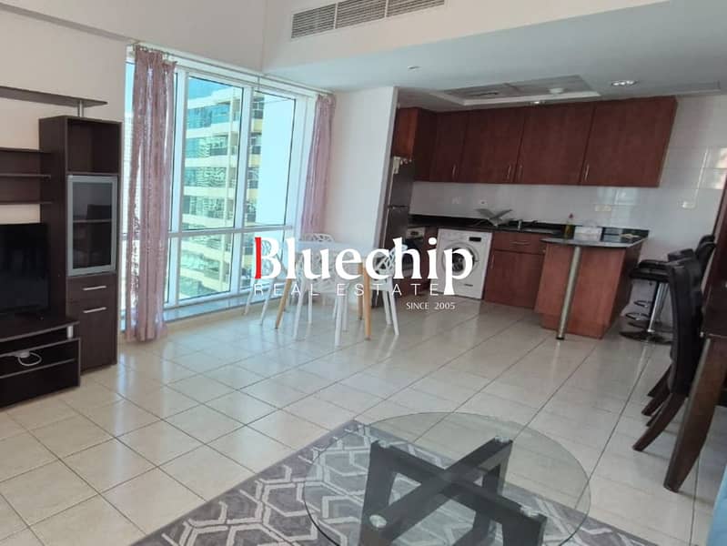 Modern Furnished 1BR | Lake & Skyline Views