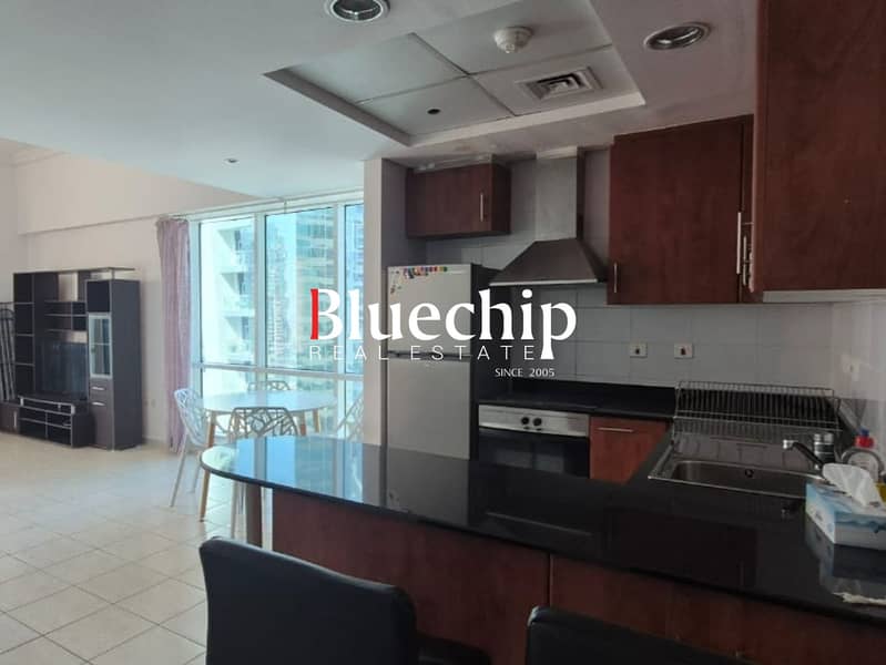 Modern Furnished 1BR | Lake & Skyline Views - Image 6
