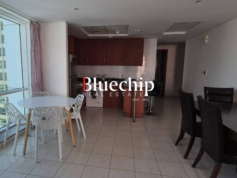 Modern Furnished 1BR | Lake & Skyline Views - Image 8