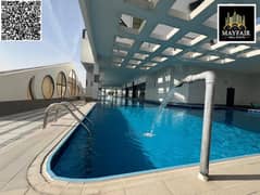 Upscale accommodation opportunity: Two bedrooms and a living room with hotel amenities in Al Rashidiya 1