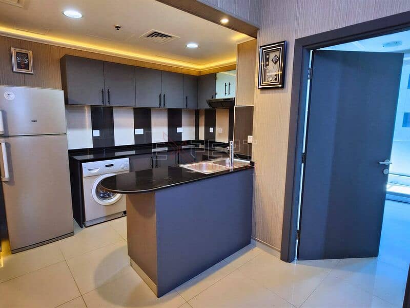 Fully Furnished |Elegant Waterfront Living | Modern 1BHK