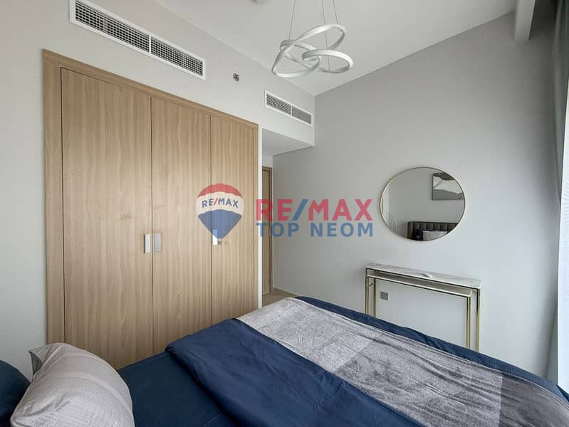 CORNER UNIT | OVERLOOKING ROAD & COMMUNITY | LUXURY FURNISHED - Image 6