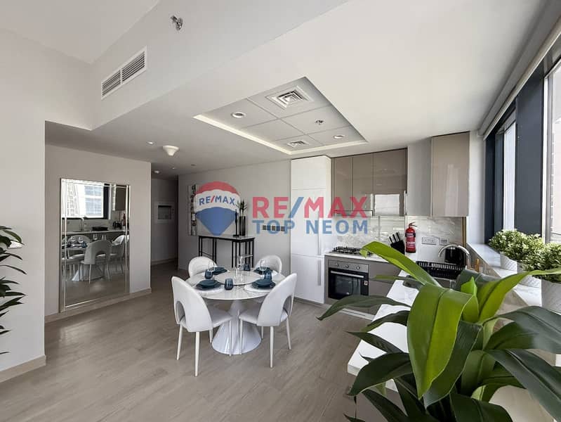 CORNER UNIT | OVERLOOKING ROAD & COMMUNITY | LUXURY FURNISHED - Image 11
