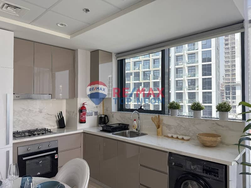 CORNER UNIT | OVERLOOKING ROAD & COMMUNITY | LUXURY FURNISHED - Image 15