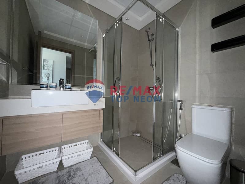 CORNER UNIT | OVERLOOKING ROAD & COMMUNITY | LUXURY FURNISHED - Image 16